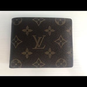 Louis Vuitton multiple pocket wallet.